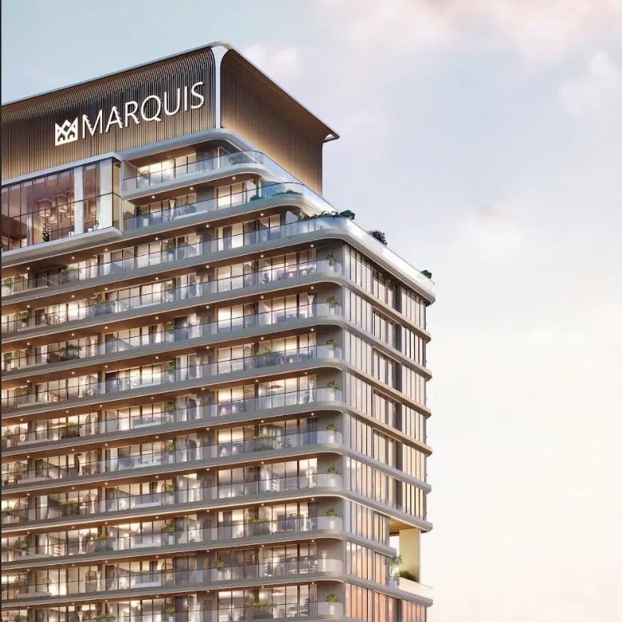 Marquis One tower in Arjan featuring glass balconies and a rooftop canopy.