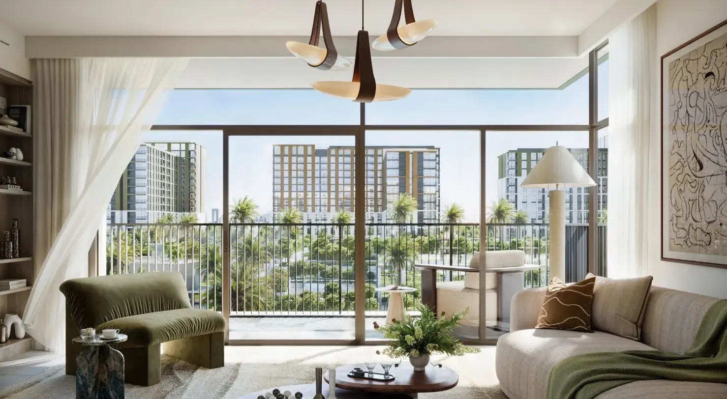 Terra Woods by Emaar living room with contemporary seating and large windows overlooking landscaped greenery.